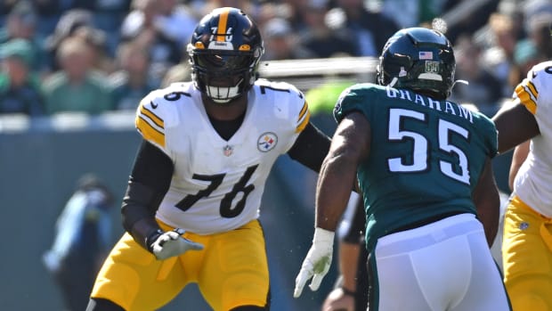 Oct 30, 2022; Philadelphia, Pennsylvania, USA; Pittsburgh Steelers offensive tackle Chukwuma Okorafor (76) blocks Philadelphia Eagles defensive end Brandon Graham (55) at Lincoln Financial Field.